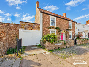 Front/Garage- click for photo gallery